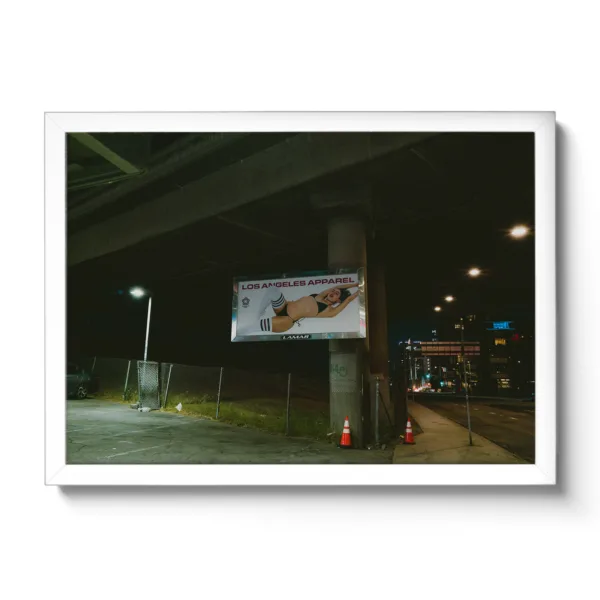 Image taken at night from a billboard showing a revealing lady in her underwear