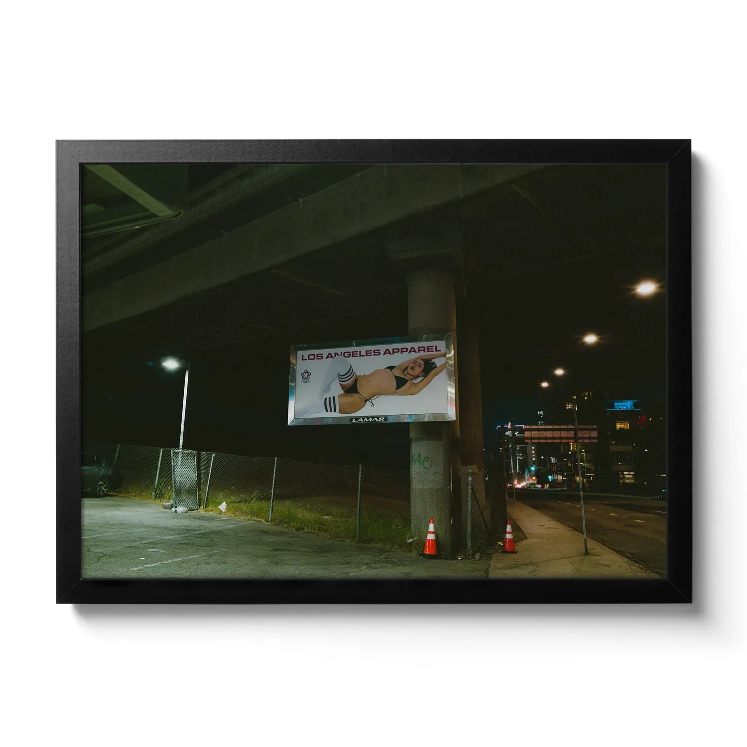 Image taken at night from a billboard showing a revealing lady in her underwear