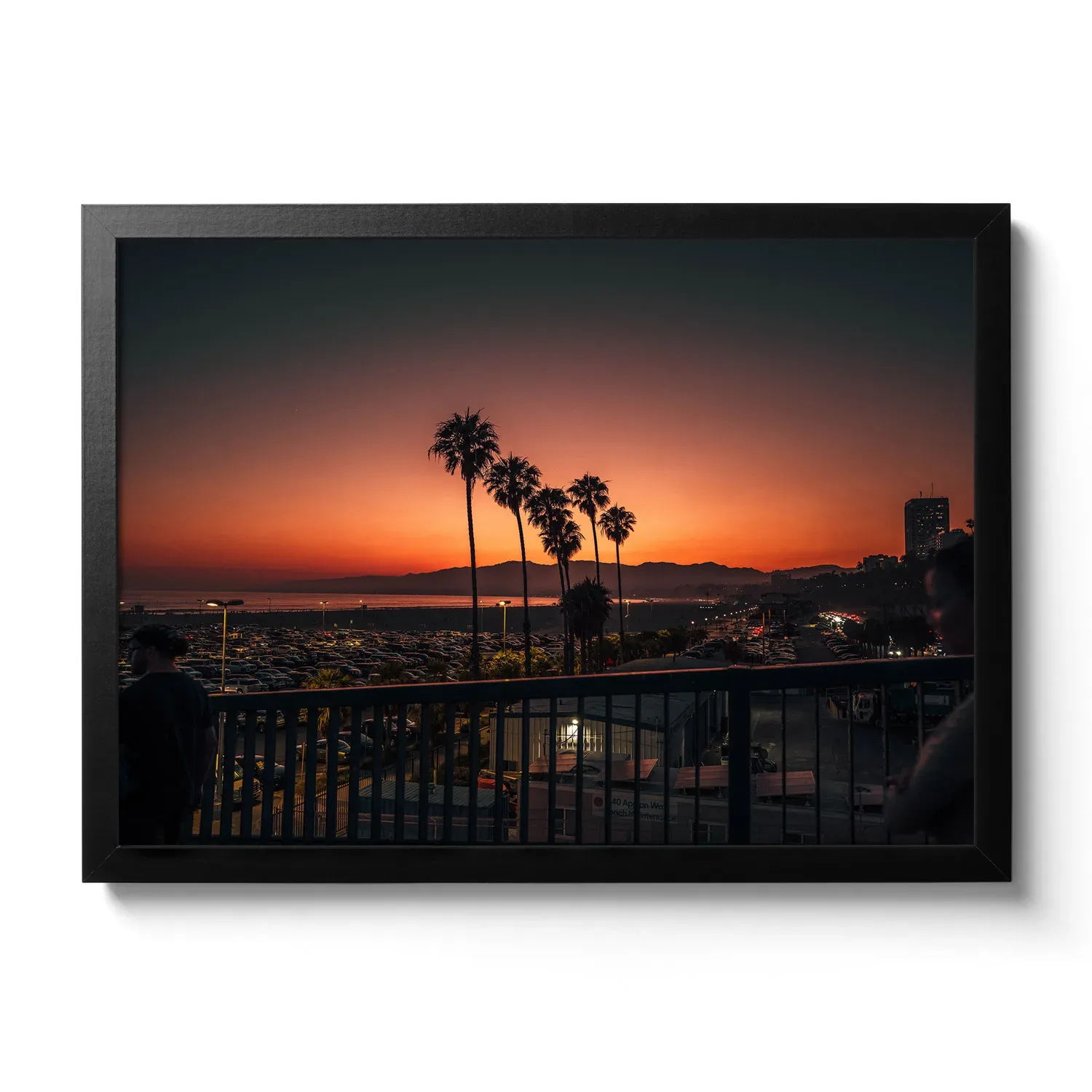 Yellow-red sunset with palm trees in Santa Monica