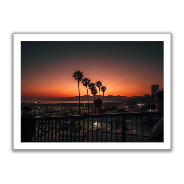 Yellow-red sunset with palm trees in Santa Monica