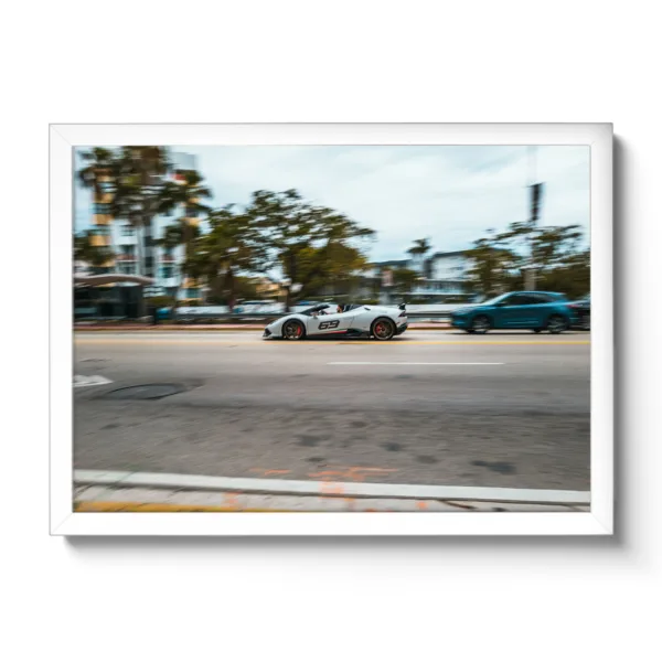 Image of a fast white Lamborghini speeding through Miami. Inscription 69.