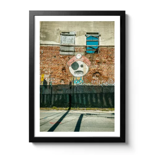 Bildaufnahme eines Graffitis auf einer Backsteinwand in Key West.