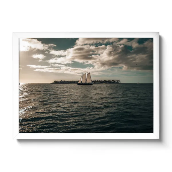 Sailboat sailing into the sunset from Key West. Picture taken from Sunset Pier - Key West