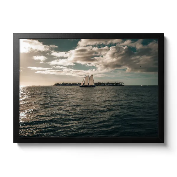 Sailboat sailing into the sunset from Key West. Picture taken from Sunset Pier - Key West