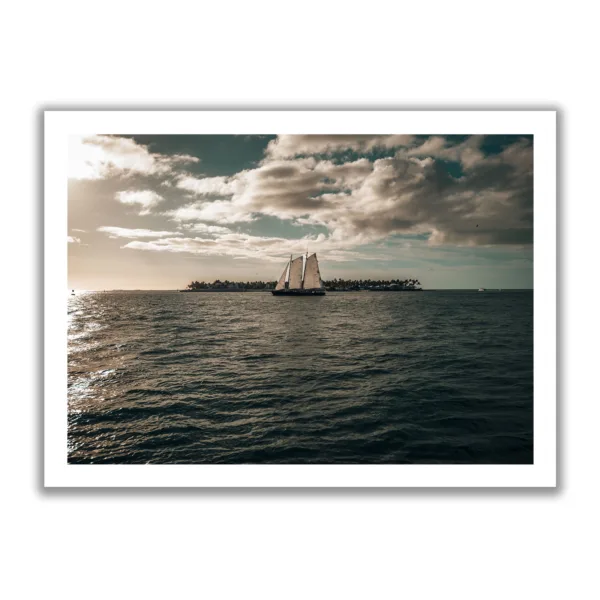 Sailboat sailing into the sunset from Key West. Picture taken from Sunset Pier - Key West