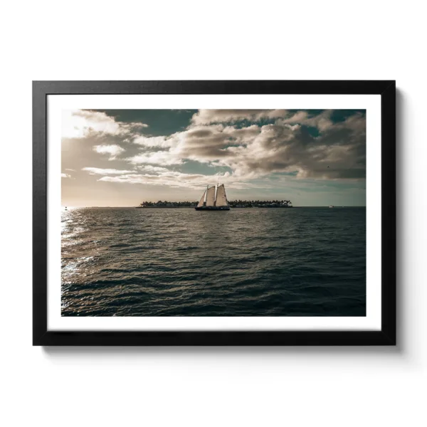 Sailboat sailing into the sunset from Key West. Picture taken from Sunset Pier - Key West