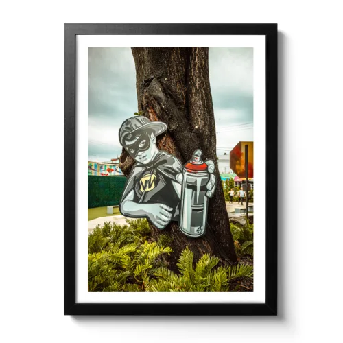 Bildaufnahme von einem Kunstwerk, dass einen jungen Graffiti Sprayer in 3D darstellt.